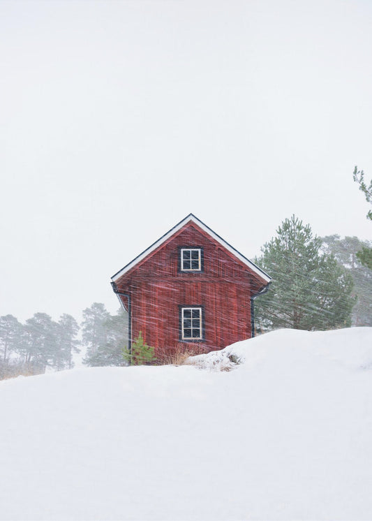 Altes rotes Haus während eines Schneesturms | Leinwand